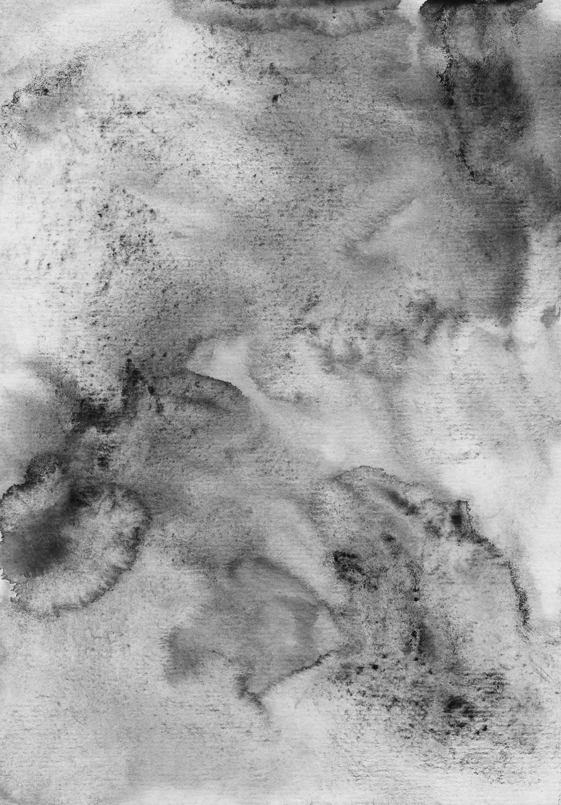 Pale grey and charcoal watercolor washes fading into textured white paper