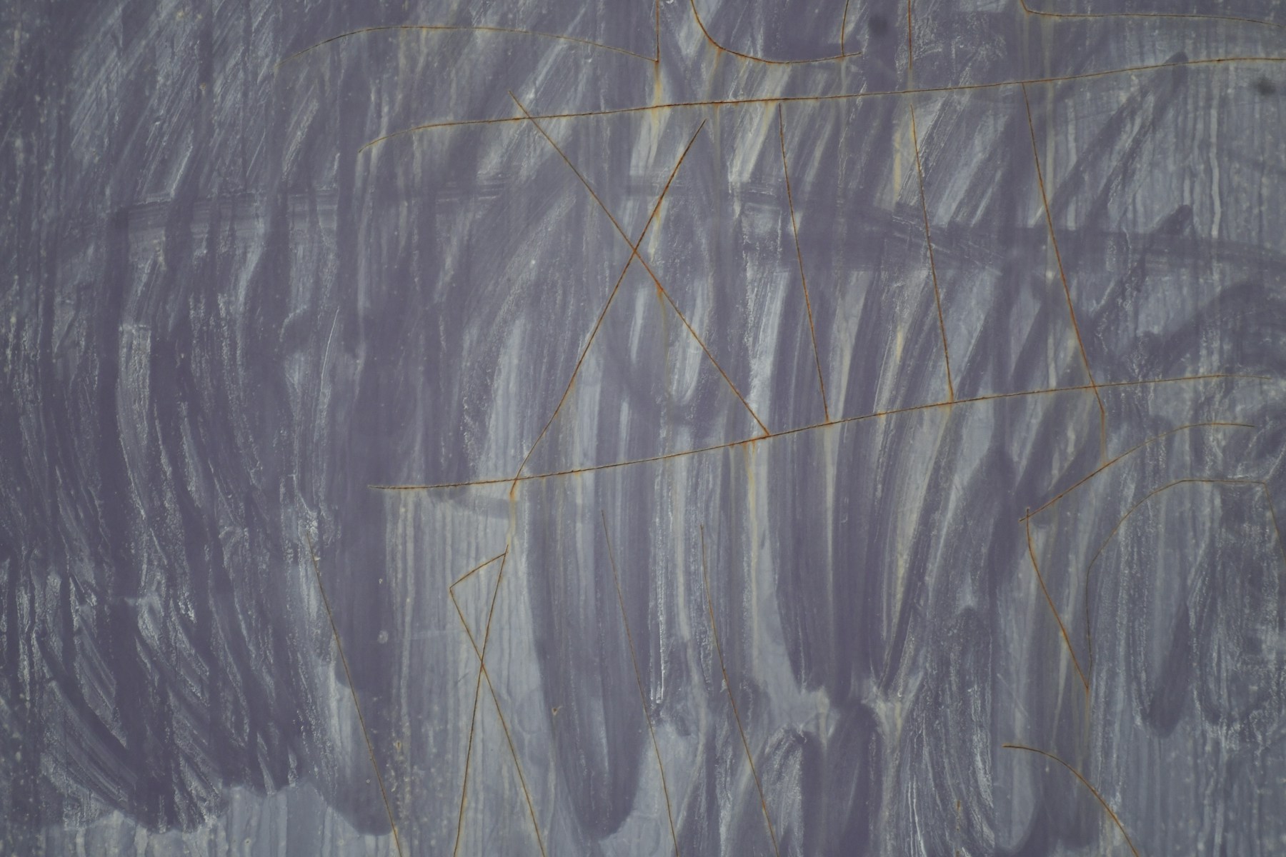 Layered grey brush marks crossed by fine rust-coloured lines